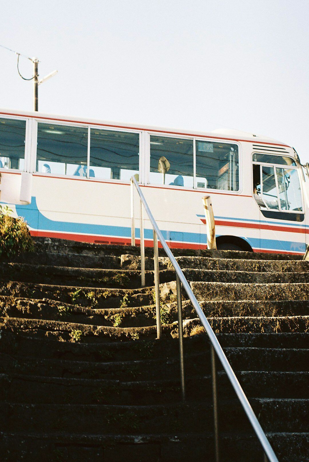 Group of seniors boarding a tour bus for a countryside trip