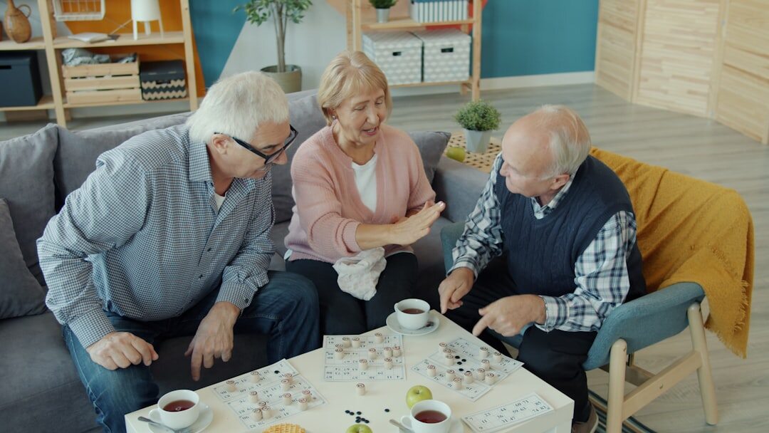 seniors playing board games indoors