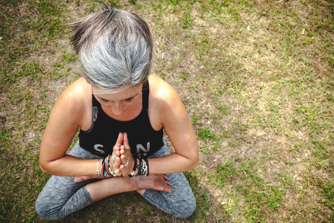 elderly woman doing yoga